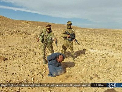 Pictures: Elimination of a spy in Anbar province Iraq by Islamic State