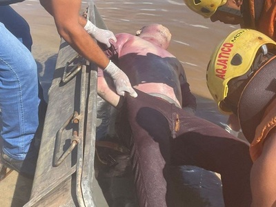 Rotten body of drowned man with his hands tied up and tongue removed