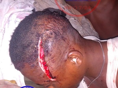 HAITIAN BARBARISM ,gang showing several rivals heads