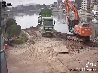 Ground swallows up truck 