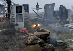 Ukrainian infantryman in a firefight inside a Bakhmut cemetery