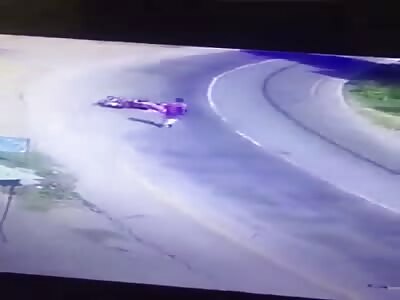 India, Scooter rider attacked.