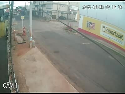 Biker flies when crossing closed sign.