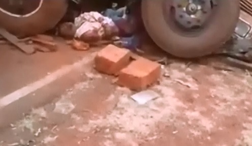 Removal of Man Crushed between 2 Trucks 