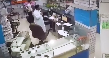 Thug uses AK-47 to Kill Man behind the Desk 