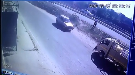 Stranded man tries Crossing Busy Highway 