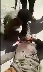 ISIS Member Attempts to Behead Man 