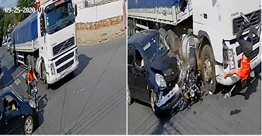 Biker Sandwiched Then Runover by Semi.