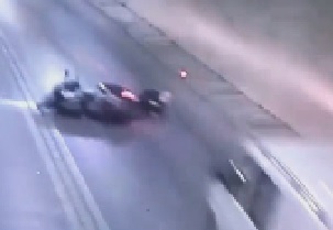 Biker Slides Directly Under a Van