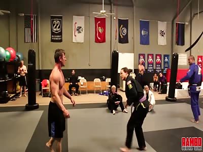 Jiu-Jitsu Girl Puts A Bodybuilder To Sleep