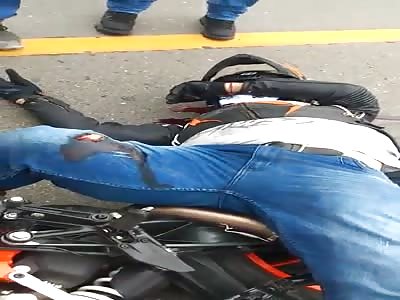 Motorcycle rear ends truck