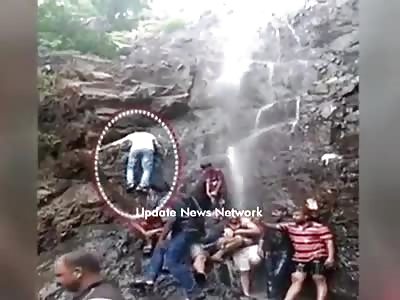  YOUTH FALLS WHILE CLIMBING WATERFALL