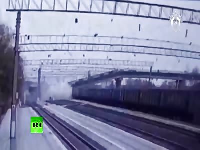BRIDGE COLLAPSES ON RAILWAY AS TRUCK DRIVES ACROSS IT