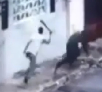 MAN BEING KILLED WITH MACHETE BLOWS