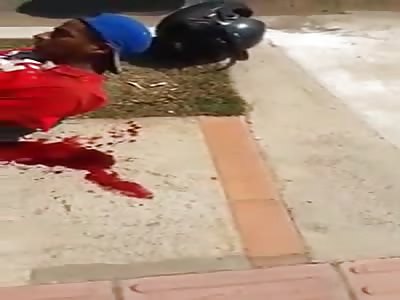 Accident leaves motorcyclist under car