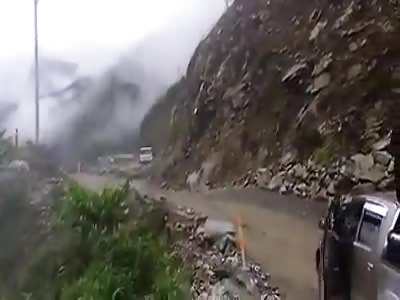 Sliding mud buries van