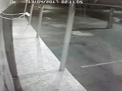 Motorcycle crushed by truck