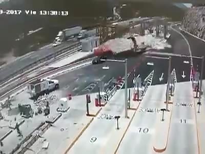Truck Crashes At Toll Gate Kills Five Road Workers.