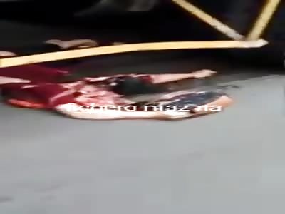 Woman is crushed by truck