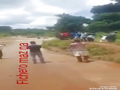 Bus dragged by river