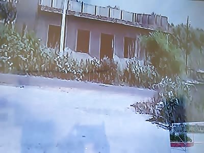 Car runs over motorcyclist and runs away