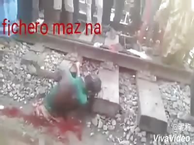 Man split in two tries to stand (new angle)