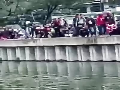 BODY RESCUE: drowned man is taken from the dam