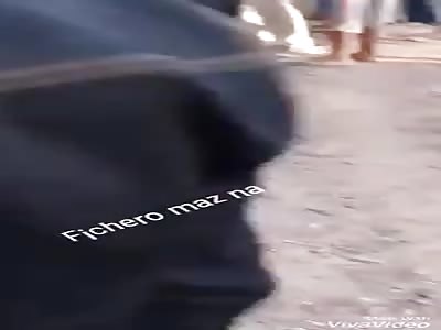 FATAL: parts of a man's body hit by the road are picked up from the asphalt