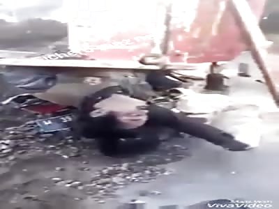 ACCIDENT: motorcyclist is under the truck