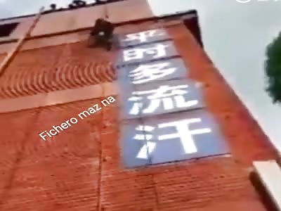 Mexican falls while training to climb the wall