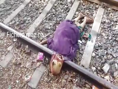 ANTIANA WITH THE HEAD CUT BY THE TRAIN