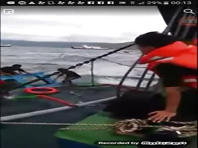 TRUCK FALLS TO SEA AND PASSENGERS ARE REMOVED