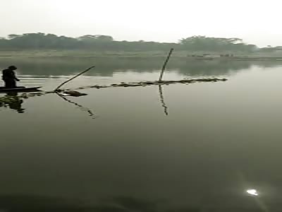 BAG WITH BODY INSIDE IS OUT OF THE LAKE