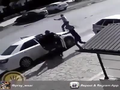 MAN IS KILLED WHEN ADDRESSING HIS CAR