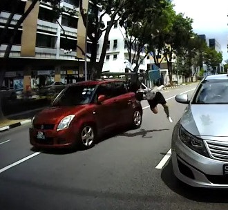 STUDENT IS ADVENTED BY THE CAR OTHER ANGLE