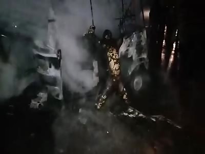 Car Bursts Into Flames, Leaving Charred Corpse of Driver in a Position Worthy of a Horror Movie