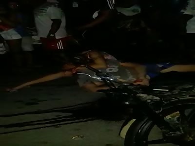 WOMAN CRIES HER DEAD HUSBAND