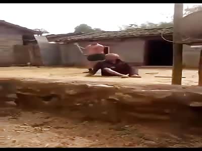 Guy Knocks out a Elderly Person with a Stick 