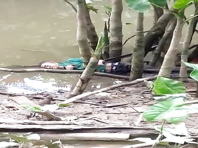 BODY OF MAN FLOATING IN THE RIVER