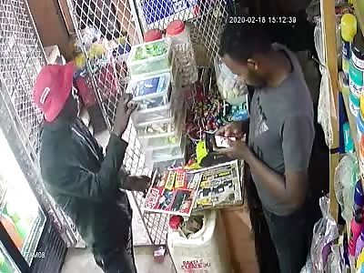 STORE OWNER RECEIVES PICKET WITH KNIFE