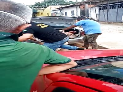 body of man with signs of torture inside the trunk of the car
