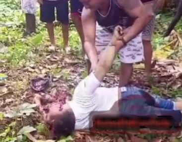 Young Man Executed by Headshot from Sicario in Forest 