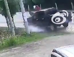 Couple on moped crashed by female driver 