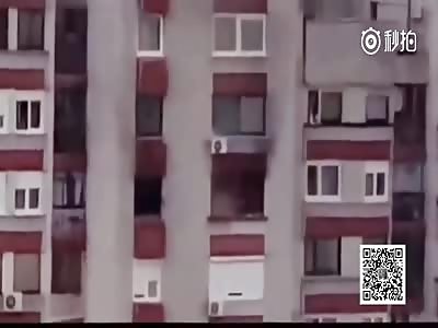 Woman Trying to Escape from Burining Building Gets Engulfed in Flame
