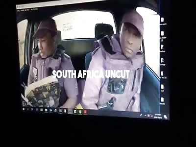 Two Armed Security Guards Killed in Their Car and Gun Stolen