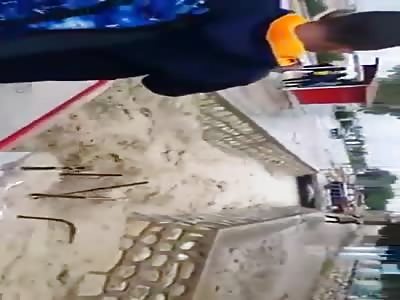 School Boy Pushes his Classmate into the Flooding Canal