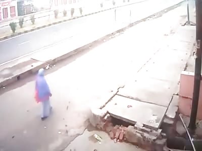 Car Flips Several Times and Wipes Out an Old Woman