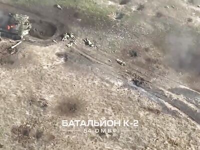Dead Russians near damaged armored vehicles