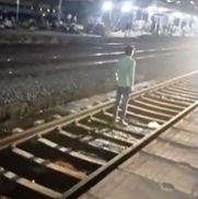 Guy Waiting On The Train