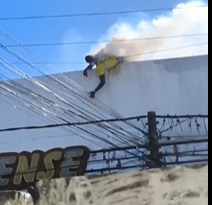 Painter Zapping Out On Power Lines